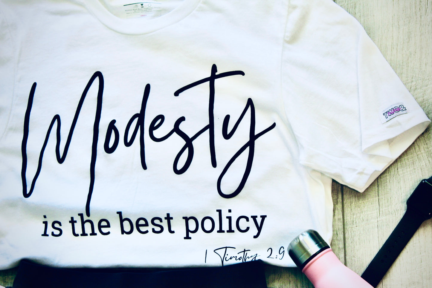 Modesty is the Best Policy Tee